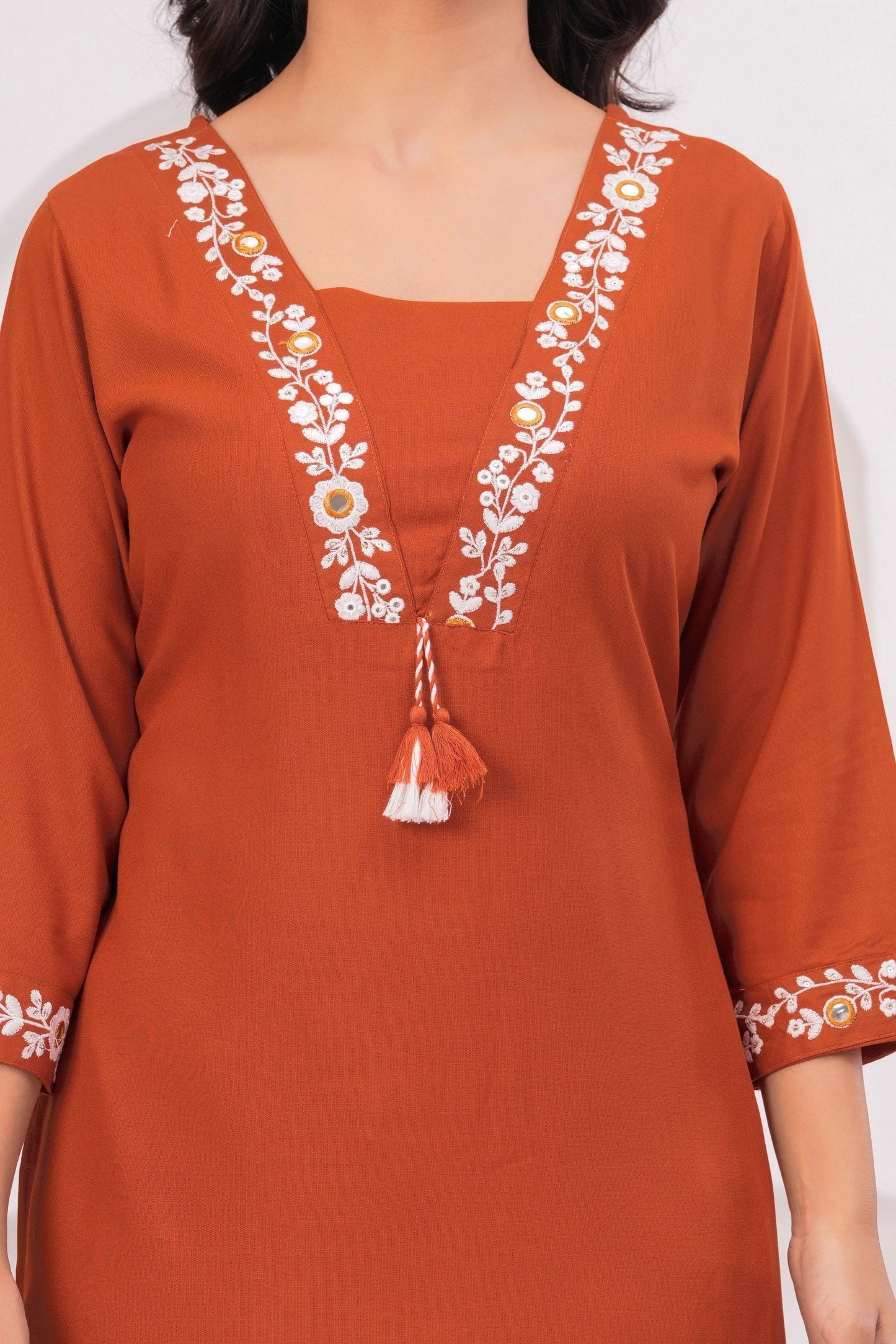 Women Rust Orange Embroidered Straight Kurta Set with Pants | V-Neck Ethnic Wear