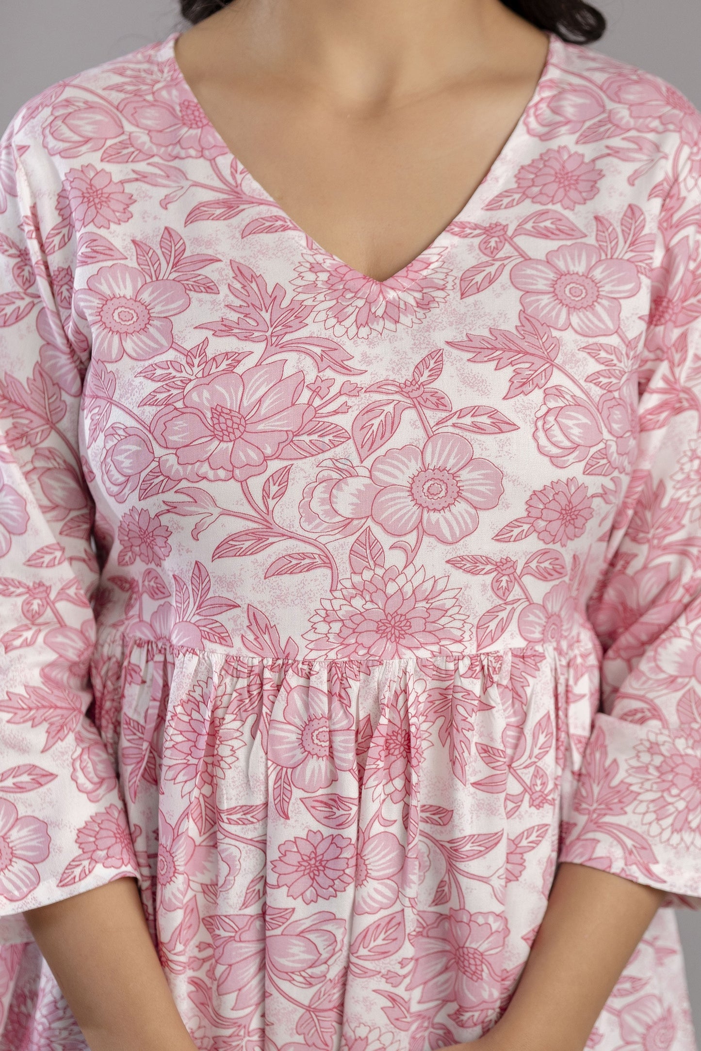 Veshviti Women Peach Floral Print Peplum Top | V-Neck Casual Wear Top