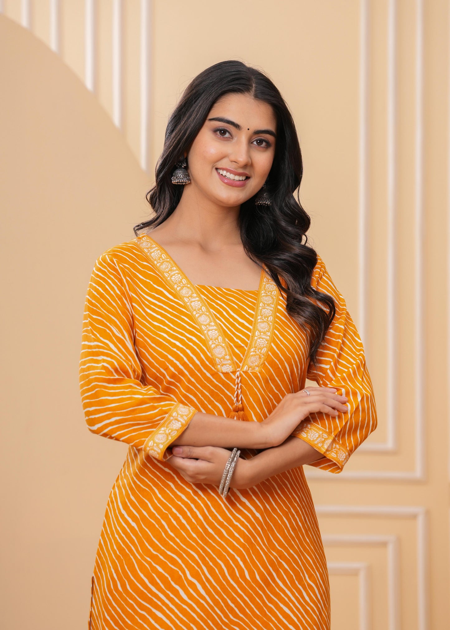 Veshviti Women Mustard Leheriya Print Straight Kurta Set with Pants | V-Neck Ethnic Wear