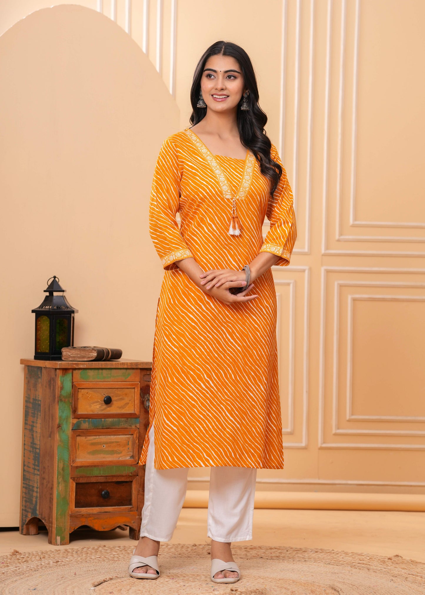 Veshviti Women Mustard Leheriya Print Straight Kurta Set with Pants | V-Neck Ethnic Wear