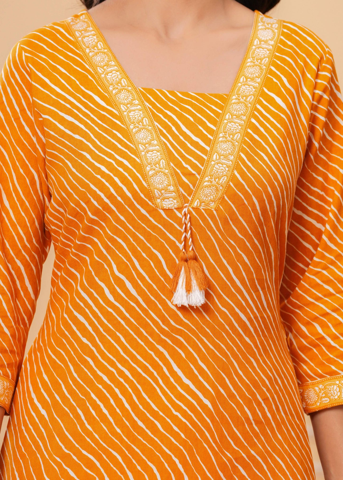 Veshviti Women Mustard Leheriya Print Straight Kurta Set with Pants | V-Neck Ethnic Wear