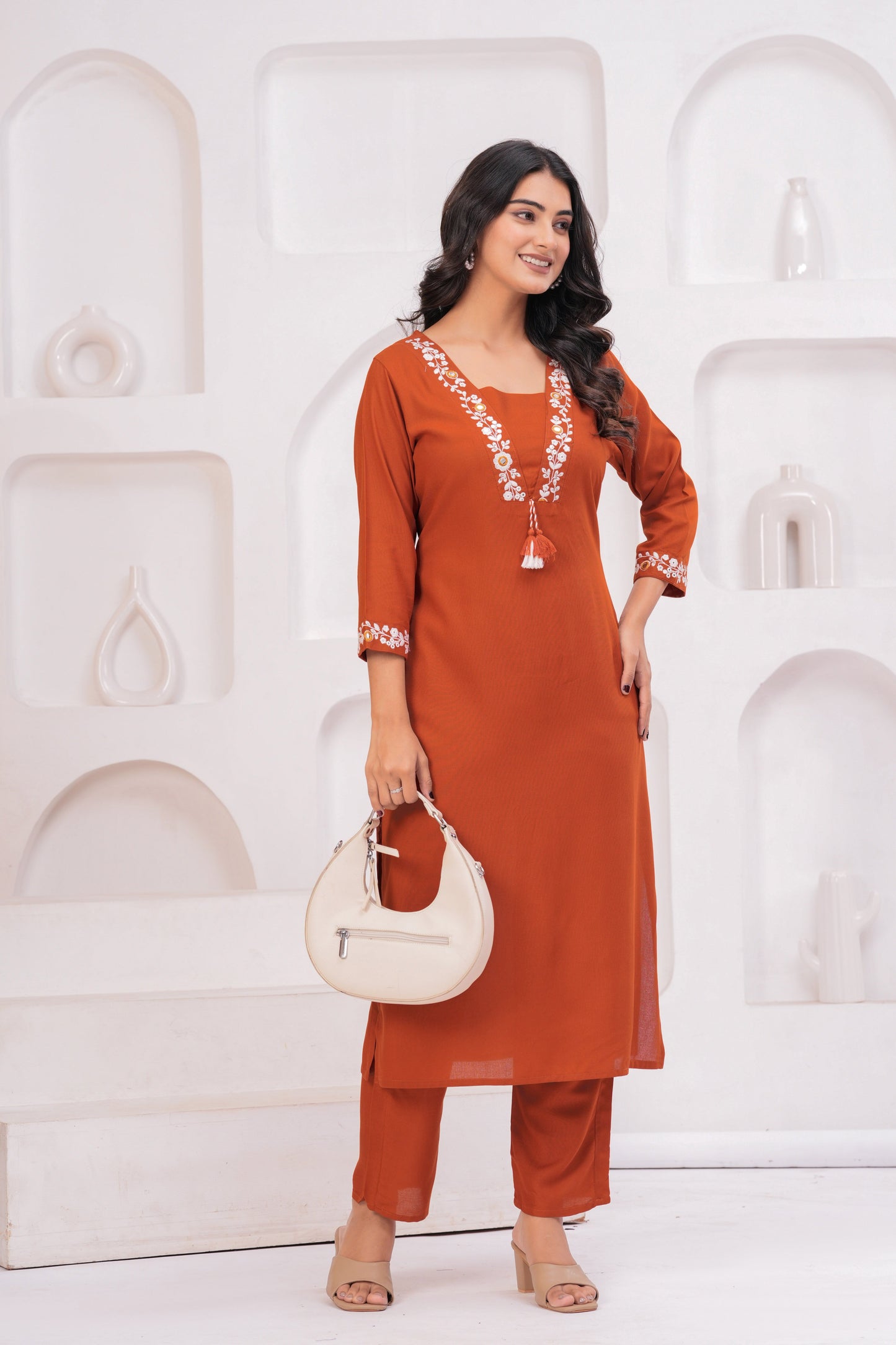 Women Rust Orange Embroidered Straight Kurta Set with Pants | V-Neck Ethnic Wear
