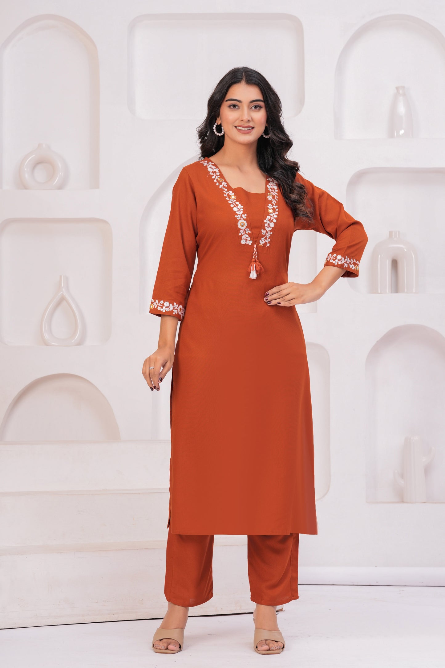 Women Rust Orange Embroidered Straight Kurta Set with Pants | V-Neck Ethnic Wear